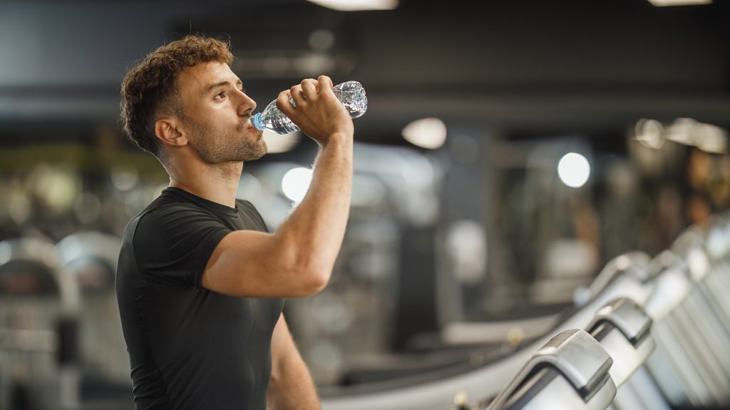 how much water should an athlete drink daily